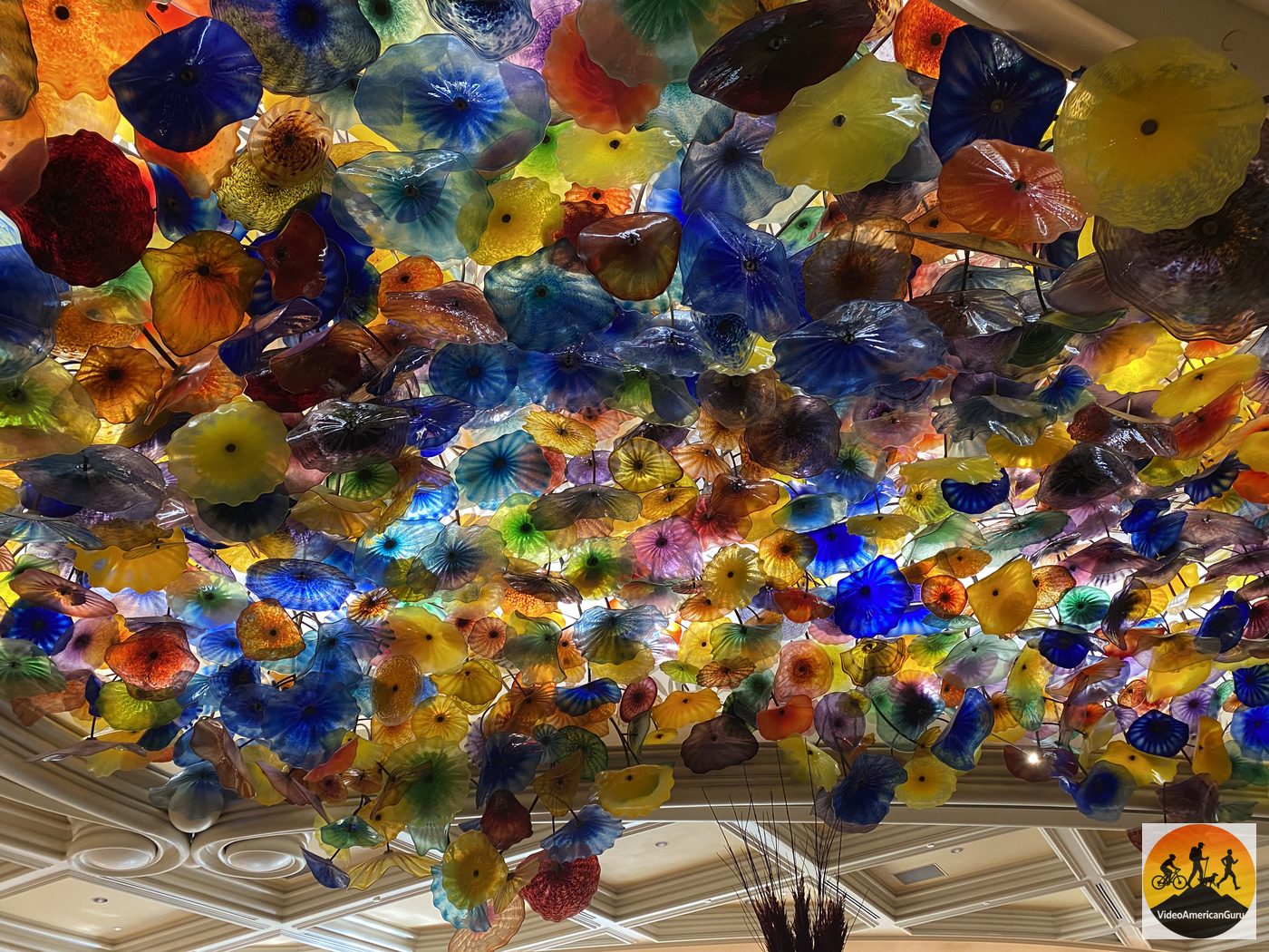 The colorful hand blown glass flower ceiling in the Bellagio lobby